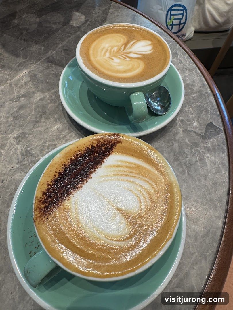 Two coffees with latte art