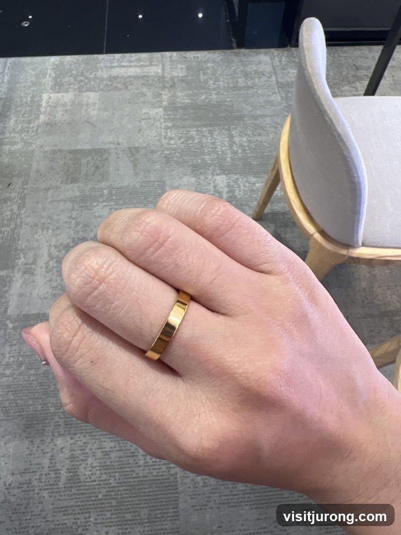 Gold Band Ring on Hand