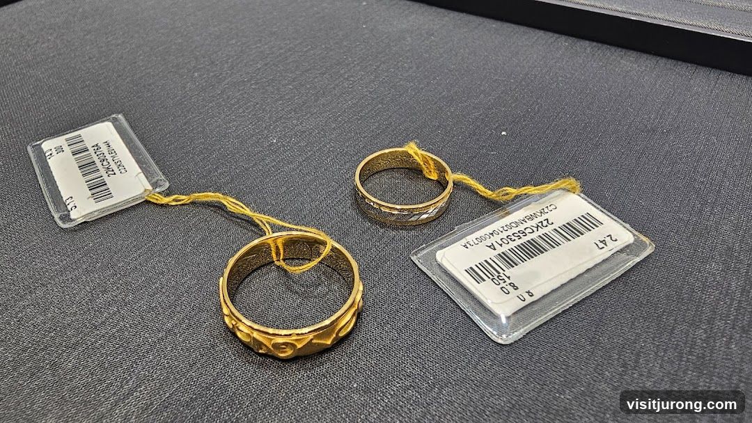 Two gold rings with tags