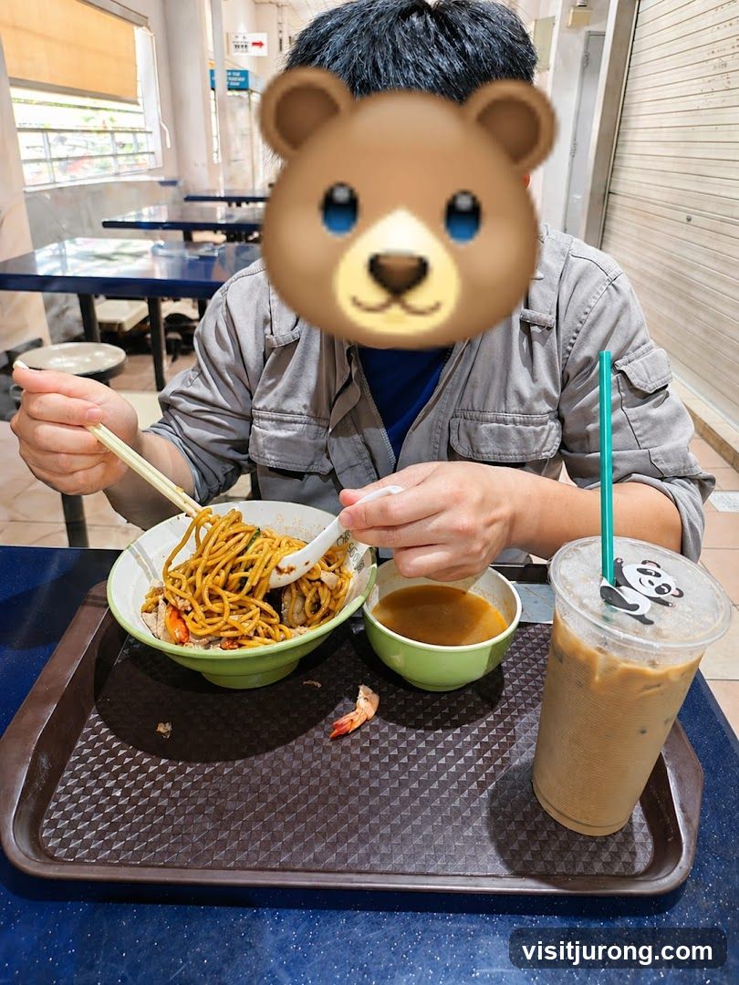 Person eating noodles