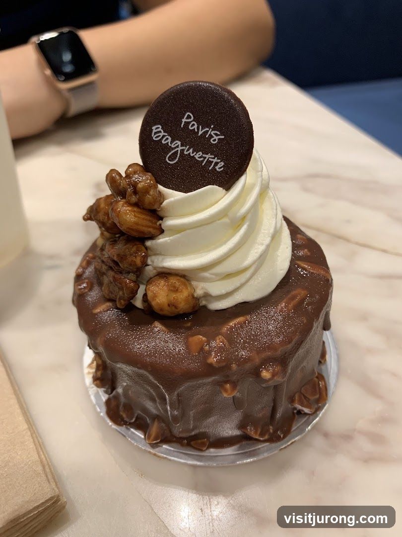 Chocolate Pastry with Whipped Cream and Nuts