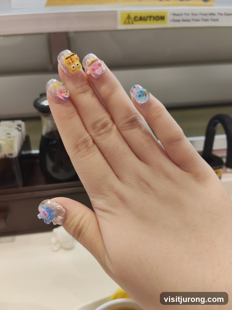 Hand with Decorated Nails
