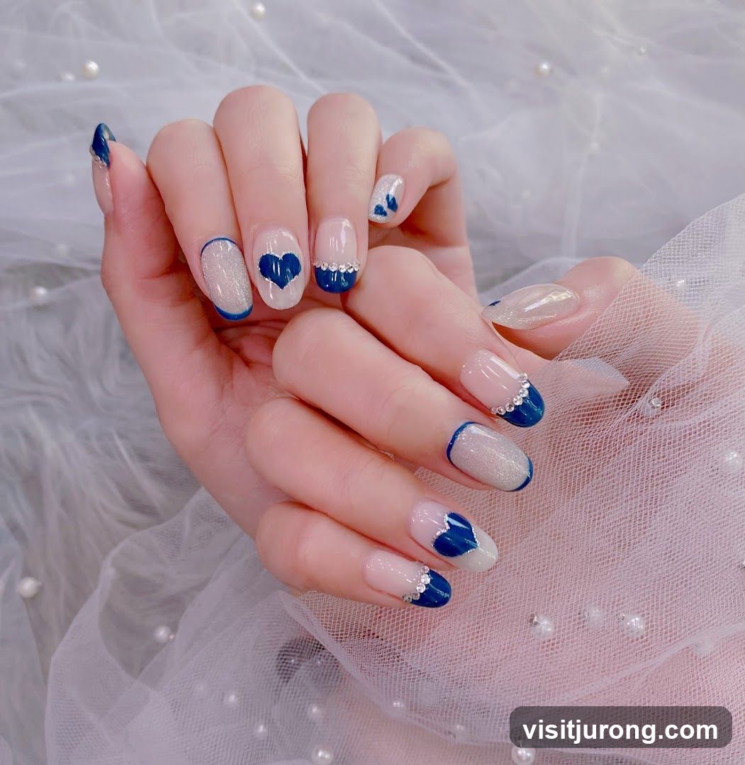 Nail Art with Blue Hearts and Glitter