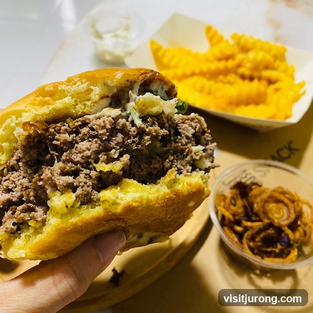 Burger with Fries and Onion Rings