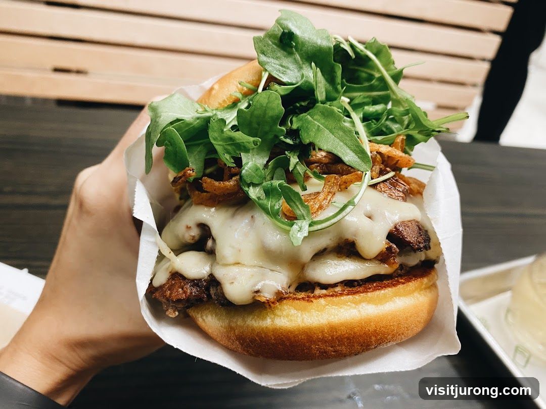 Burger with Melted Cheese and Arugula
