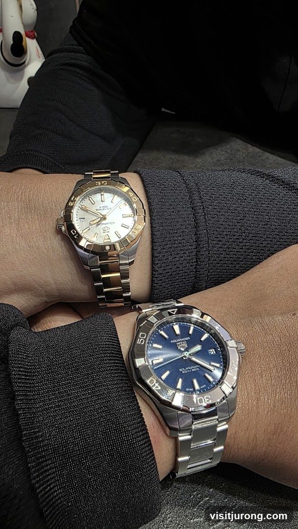 Two Watches on Wrists