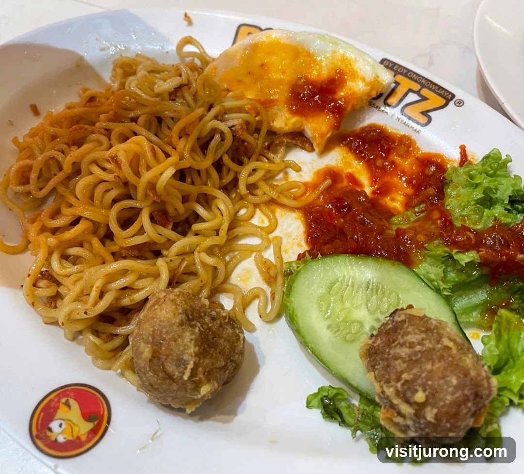Noodles with Fried Egg and Meatballs