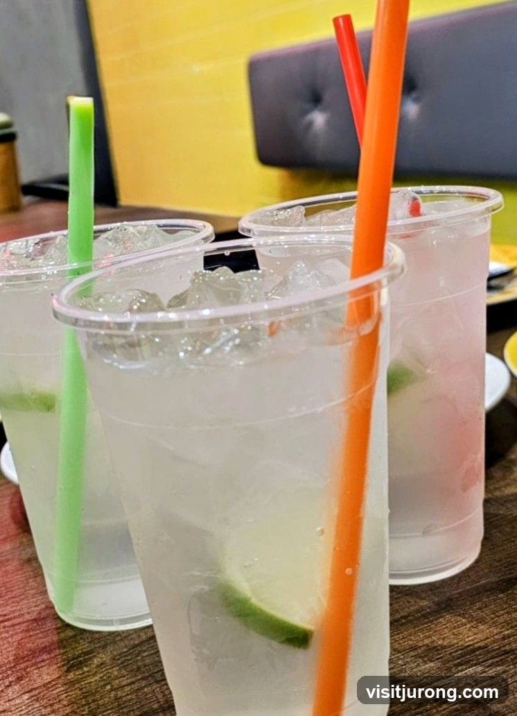 Three drinks with straws