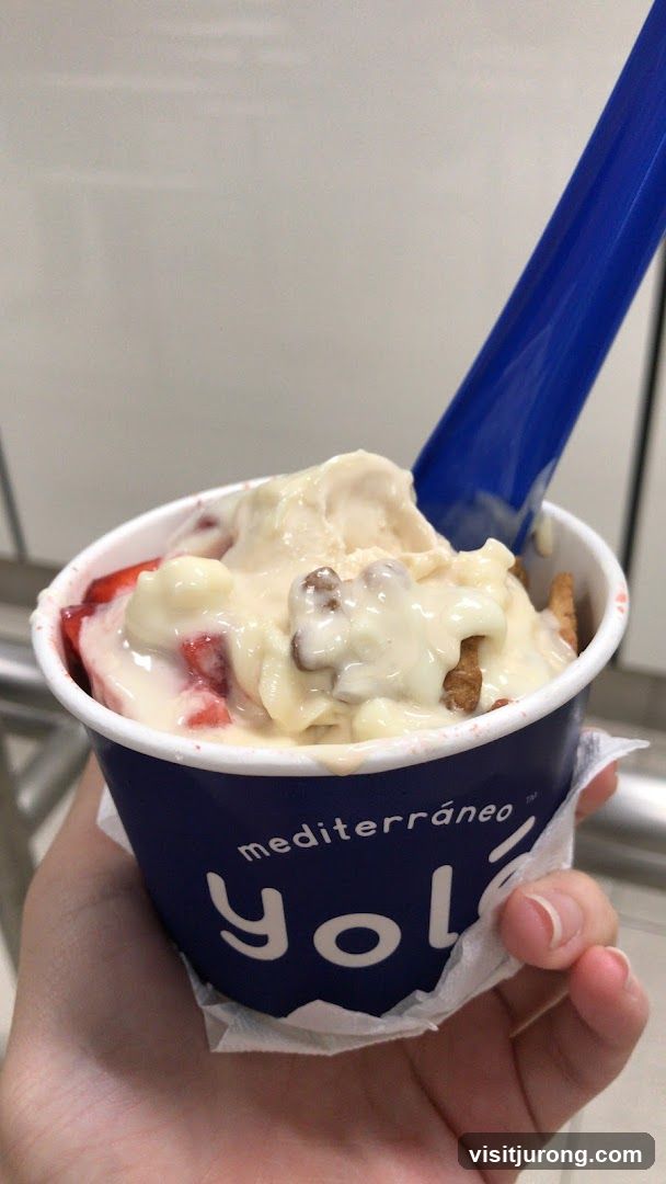 Yolé Frozen Yogurt with Strawberries and Toppings