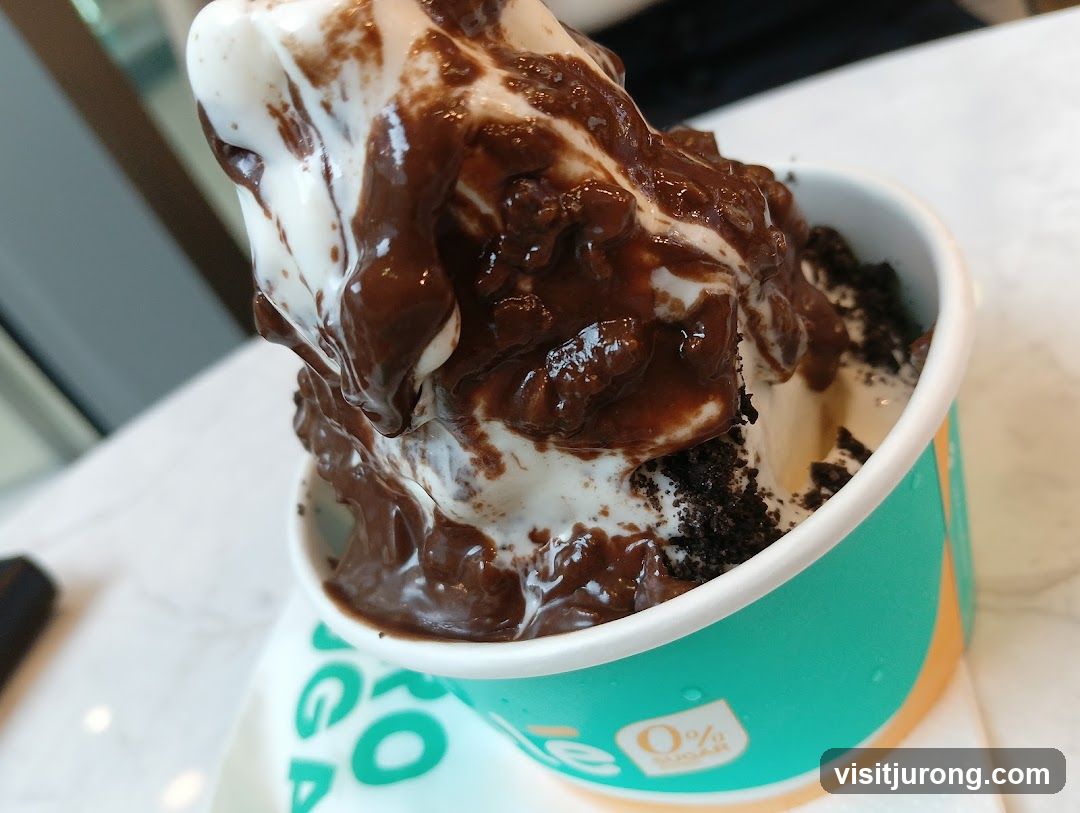 Ice cream with chocolate sauce and cookie crumbles