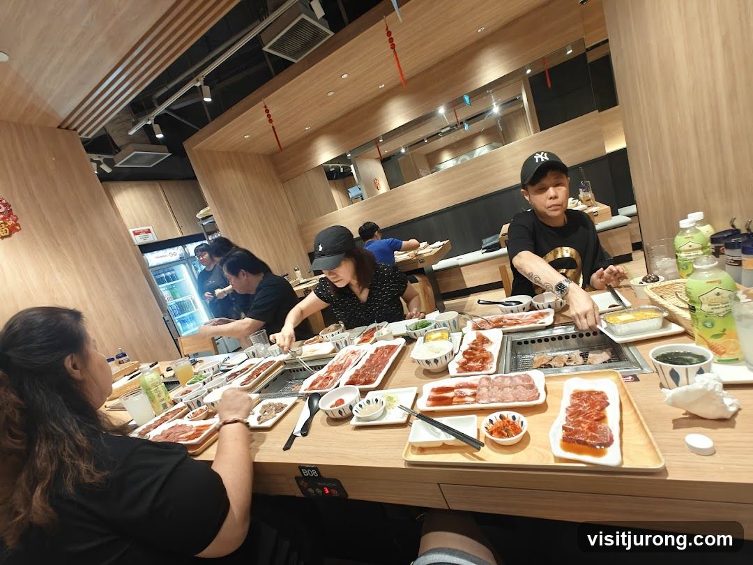 Diners at a Korean BBQ restaurant
