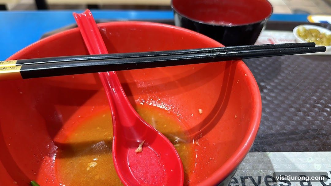 Empty Ramen Bowl with Chopsticks and Spoon