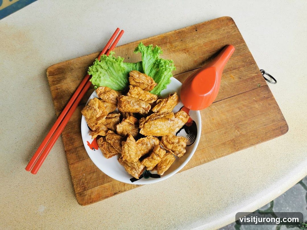 Fried Food with Lettuce and Chopsticks