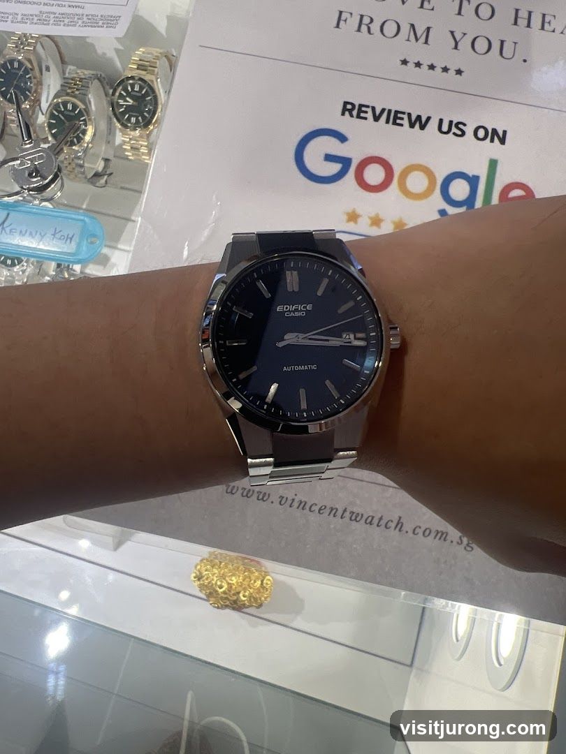 Watch on wrist with Google review sign