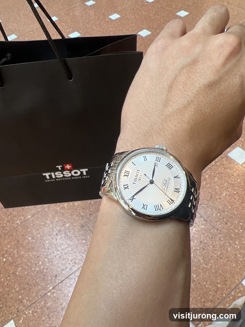 Tissot Watch and Shopping Bag
