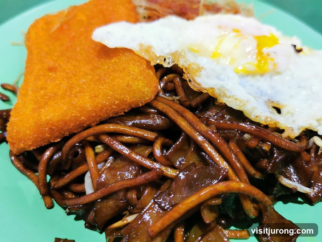 Fried Noodles with Egg and Fried Patty