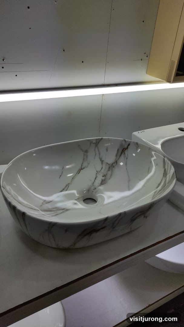 Marble-patterned vessel sink