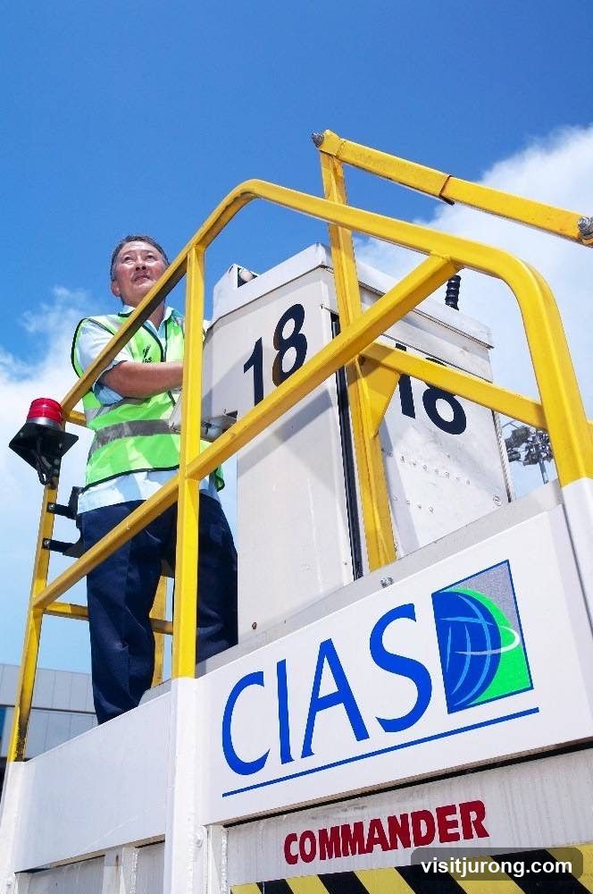 Man in safety vest on platform