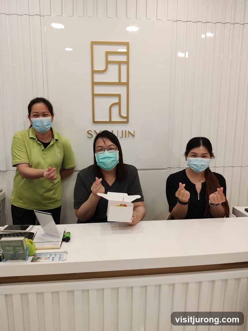 Three women behind a counter