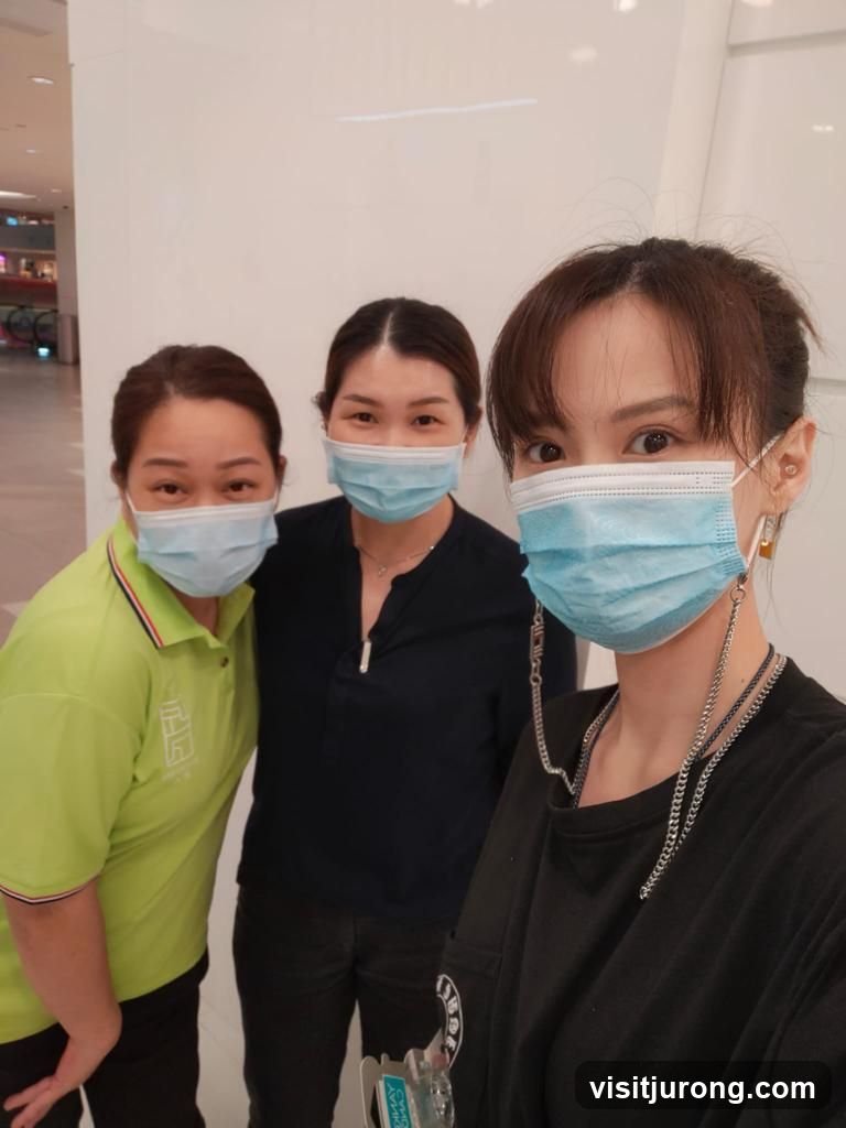 Three women wearing masks