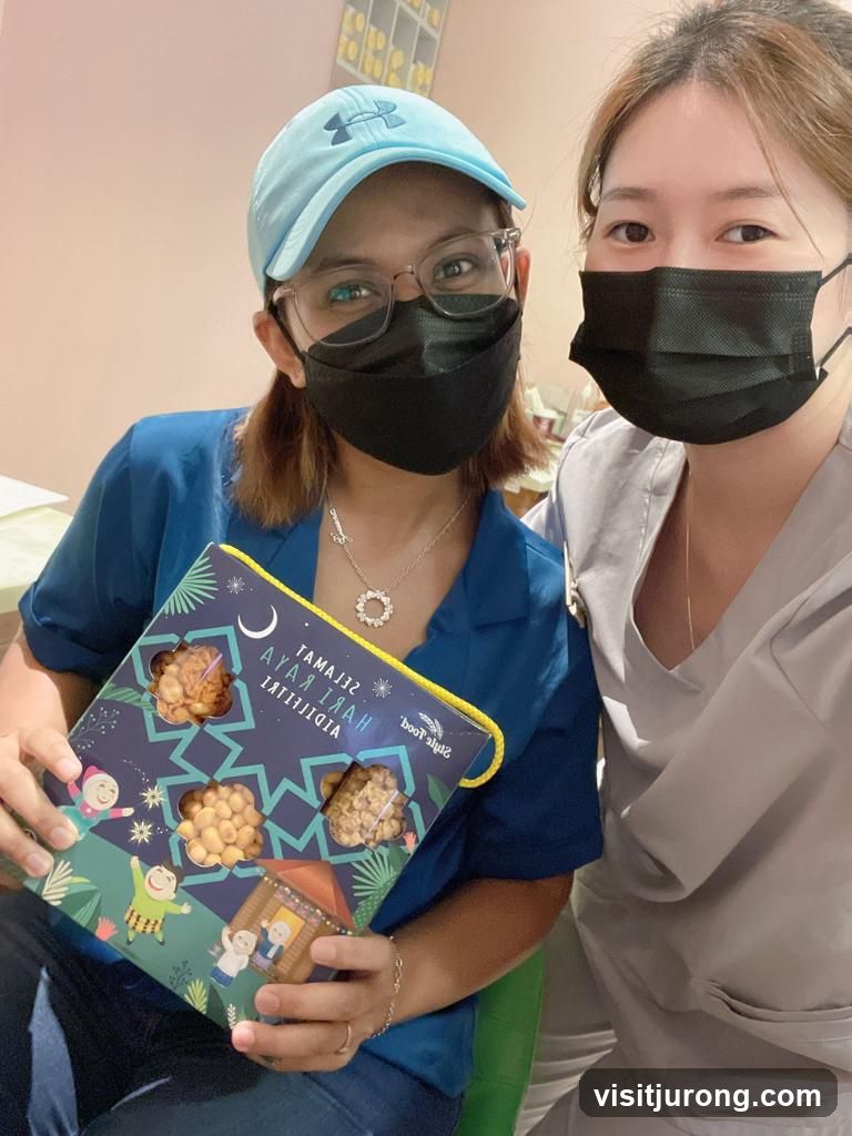 Two Women with a Box of Snacks