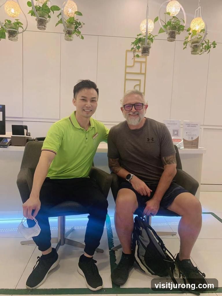 Two men sitting in chairs