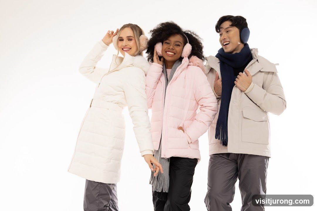 Three people in winter coats