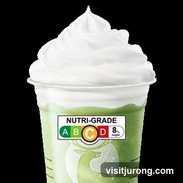 Green beverage with whipped cream and Nutri-Grade label
