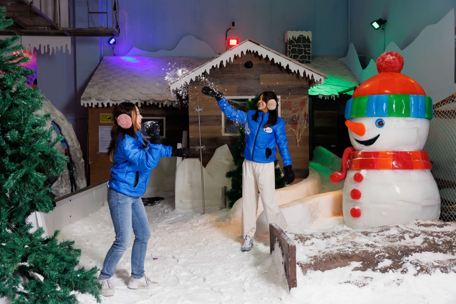 Families playing in real snow inside Snow City Jurong East